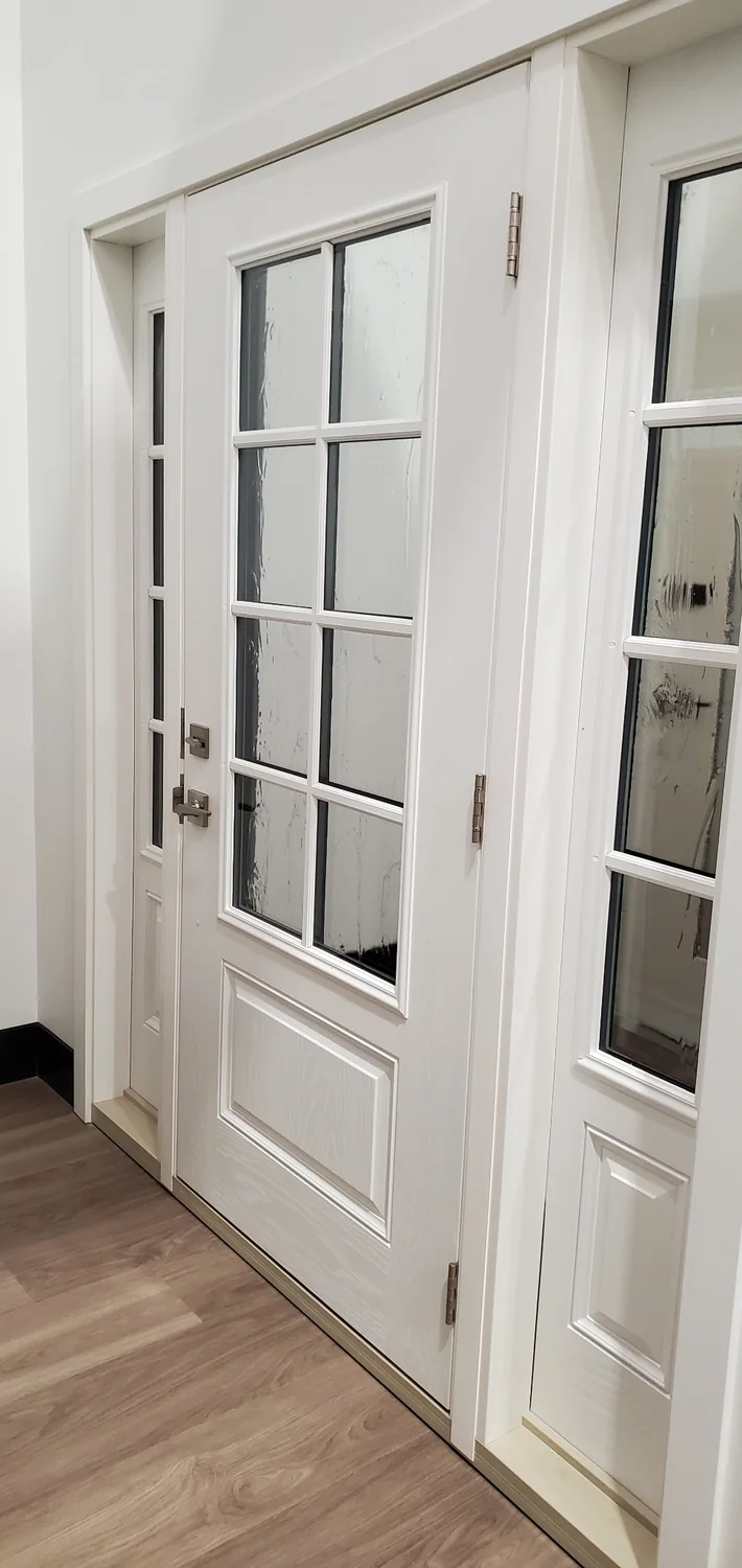 White entry door with sidelites