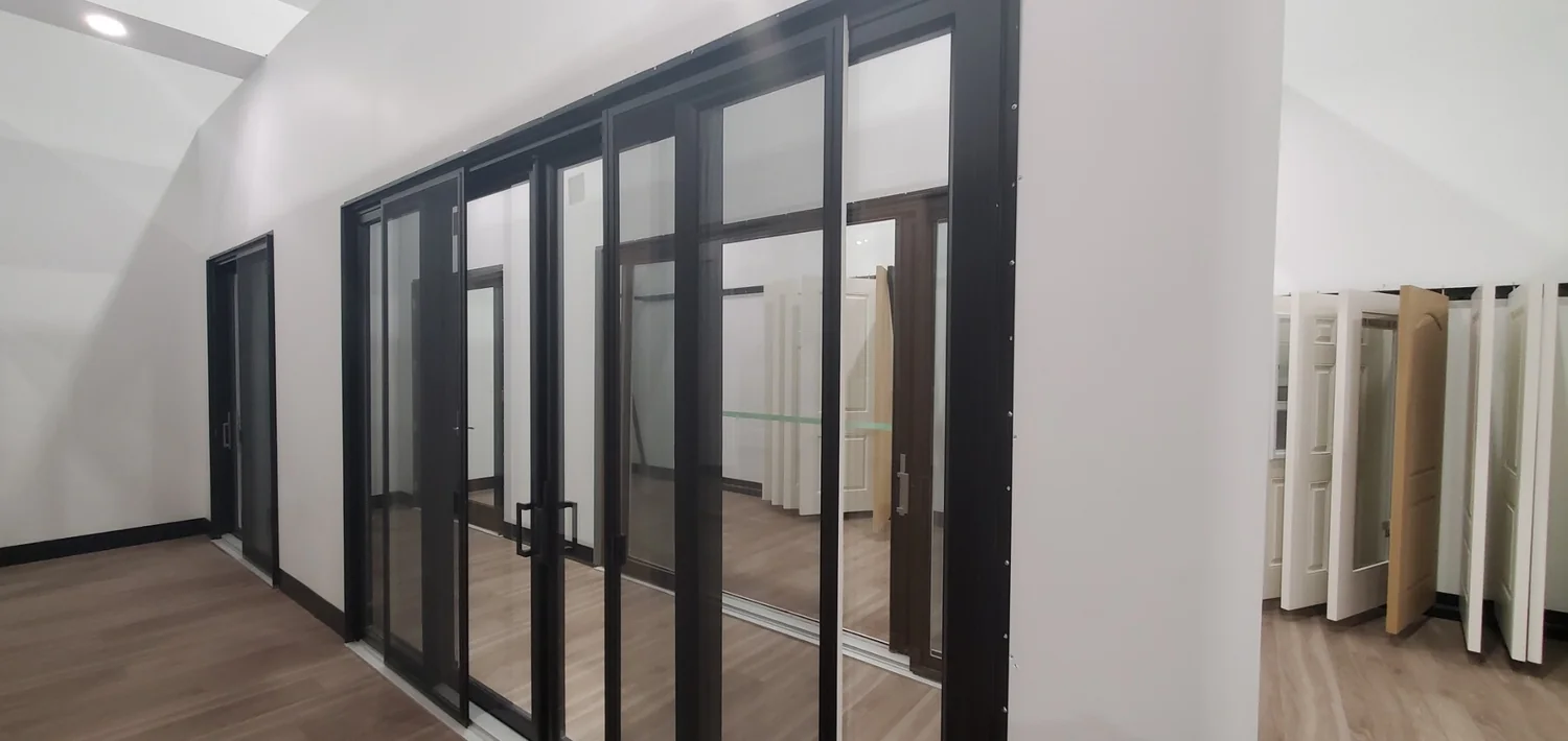 Wide black multi-panel patio wall